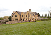 Stone exterior of Cotswolds country house UK