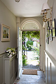 View through doorway to front garden of Dorset home, England, UK