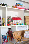 Childrens toy storage in Dorset cottage, England, UK