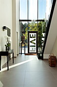 Spacious double height entrance hallway in contemporary new build, Kingston upon Thames, England, UK