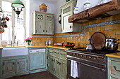 Farmhouse kitchen with paint effect cupboards, Mougins, Alpes-Maritime, South of France