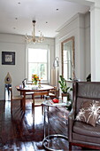 Vintage dining table and chairs in London townhouse, England, UK
