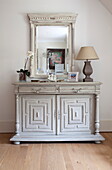 Antique sideboard and mirror in Kent home, England, UK