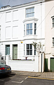 Three-storey facade of Brighton home, East Sussex, England, UK