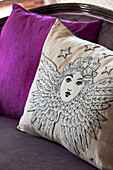 Embroidered female head embroidered onto cushion in London townhouse   England   UK