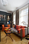Orange fabrics in London townhouse living room UK