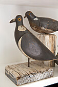 Bird figurines in Arundel home West Sussex England UK