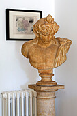 Historic bust on plinth in Var farmhouse Provence France