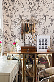 Necklaces and jewellery box with patterned wallpaper in Brighouse bedroom West Yorkshire UK