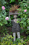 Garden sculpture in back garden of London townhouse UK