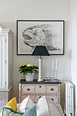 Large fish drawing love chest with black lamp in Grade II listed villa Arundel West Sussex UK
