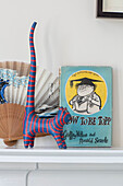 Striped hat with book and fan in Sevenoaks home Kent UK