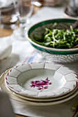Ceramic bowl and salad on dining table in Somerset farmhouse UK