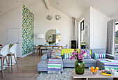 Colourful open plan living room in new build home Cornwall UK