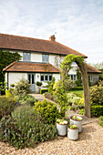 Front path and porch of detached Hampshire home England UK