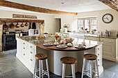 Large island unit with breakfast bar and granite worktops in Grade II listed Georgian farmhouse Somerset, UK