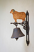 Ram ornament on antique bell in Georgian rectory West Sussex UK