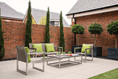 Chrome table and terrace seating on private terrace of Hampshire newbuild UK
