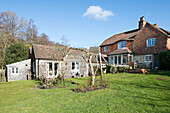 Garden extension to 1860s Victorian cottage in Midhurst West Sussex UK