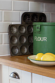 French vintage trays and enamel flour bin in Derbyshire kitchen UK
