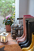 Wellington boots in porch of Hampshire cottage UK