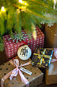 Wrapped presents under tree in Hampshire cottage UK