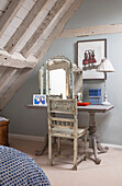 Dressing table and chair in attic bedroom Grade II listed Georgian country house West Sussex UK