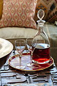 Decanter and wine glasses on coffee table Southwest London UK