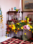 Cut flowers on ribbon in bedroom of Isle of Wight home UK