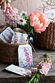 Foxglove seed packets on a tabletop with flowers