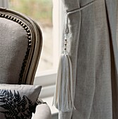 Window treatment curtain and tieback in neutral colours