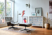 Vintage lounge chair and chest of drawers in the living room