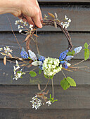 A wreath of birch twigs and spring flowers