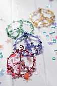 Colourful peace sign glitter decorations