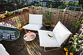 Tray top table and comfortable seating on a rooftop terrace