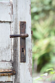 Old wooden door with antique door handle
