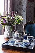 Cut flowers and Victorian tea tray in Benedict s B&B, St Leonards-on-Sea