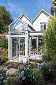 Cottage with conservatory extension