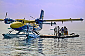 Seaplane next to a jetty in the Maldives