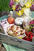 Picnic with strawberries and puff pastry hearts for Mother's Day