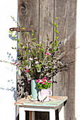 Spring bouquet of bellis in mini vases