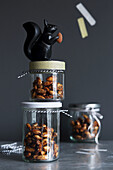 Spicy roasted almonds in jars