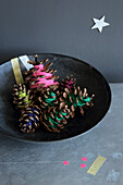 Cones decorated with colorful wool scraps