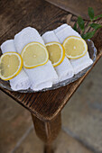 Towel rolls with lemon slices