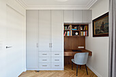 Floor-to-ceiling built-in wardrobe and small workstation