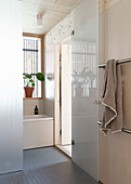 Ensuite bathroom with frosted glass door