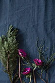 Fir greenery and ranunculus for a bouquet