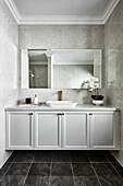 Bathroom in dark and light tones, shaker-style vanity unit