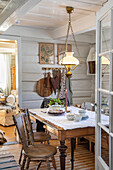 Country-style dining area with rustic wooden table