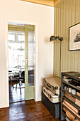 Vintage suitcases, sideboard and view of dining table